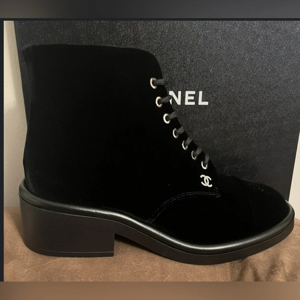 Chanel logo black combat ankle boots